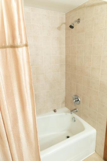 Some of the tile detail of upper-level full Bath