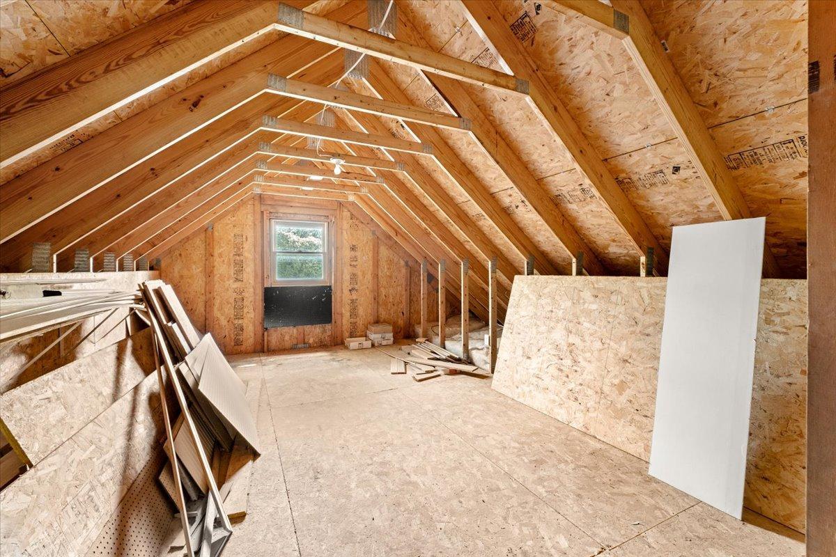 Upper loft area above the garage, ready for your vision!