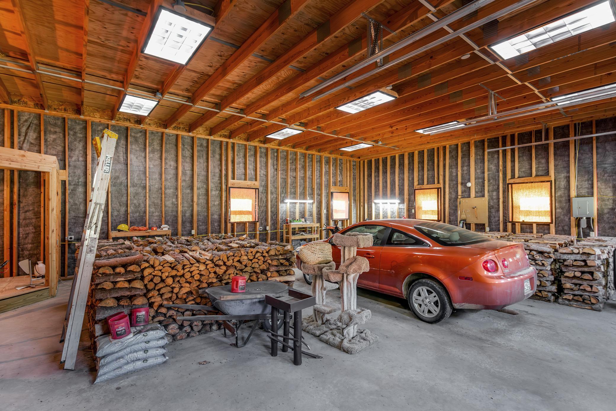 3 car garage - 14 ft Sidewalls - 12 ft doors