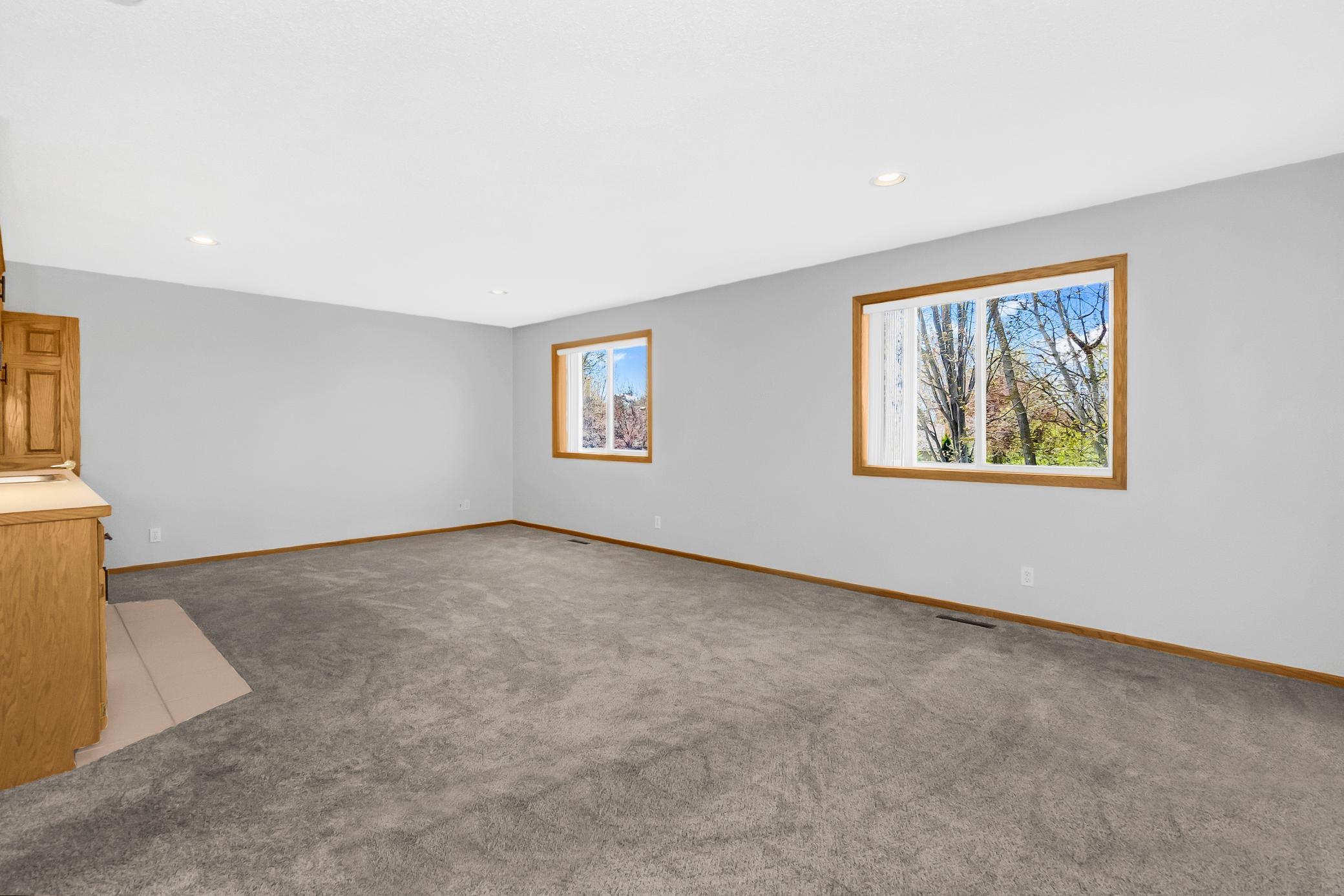 Large bedroom with bright natural light.