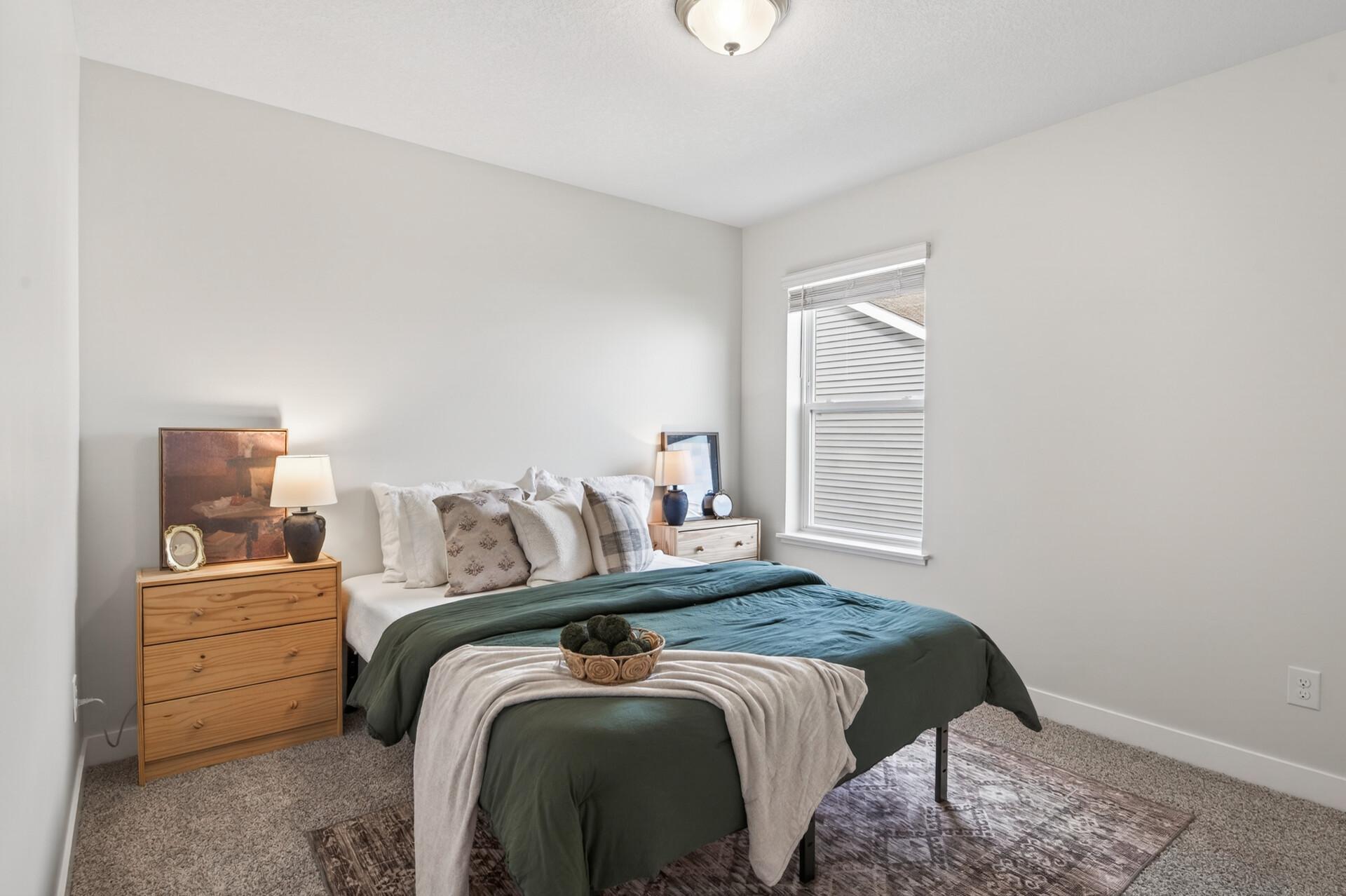 Bedroom on uppper level designed for comfort and relaxation.