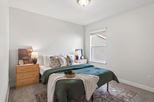 Bedroom on uppper level designed for comfort and relaxation.