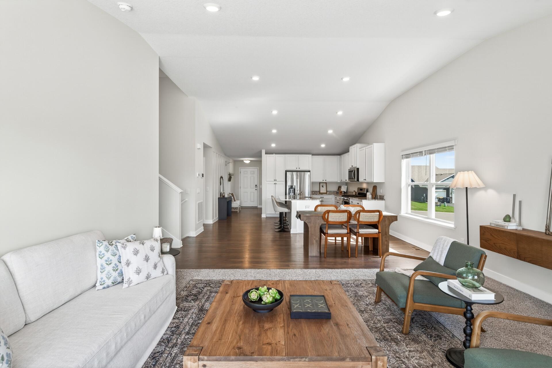 Thoughtfully designed floor plan connecting the kitchen, dining, and living spaces beautifully.