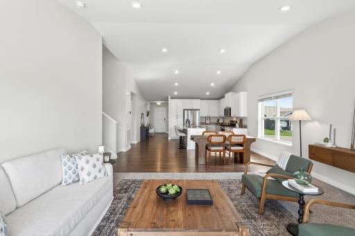 Thoughtfully designed floor plan connecting the kitchen, dining, and living spaces beautifully.