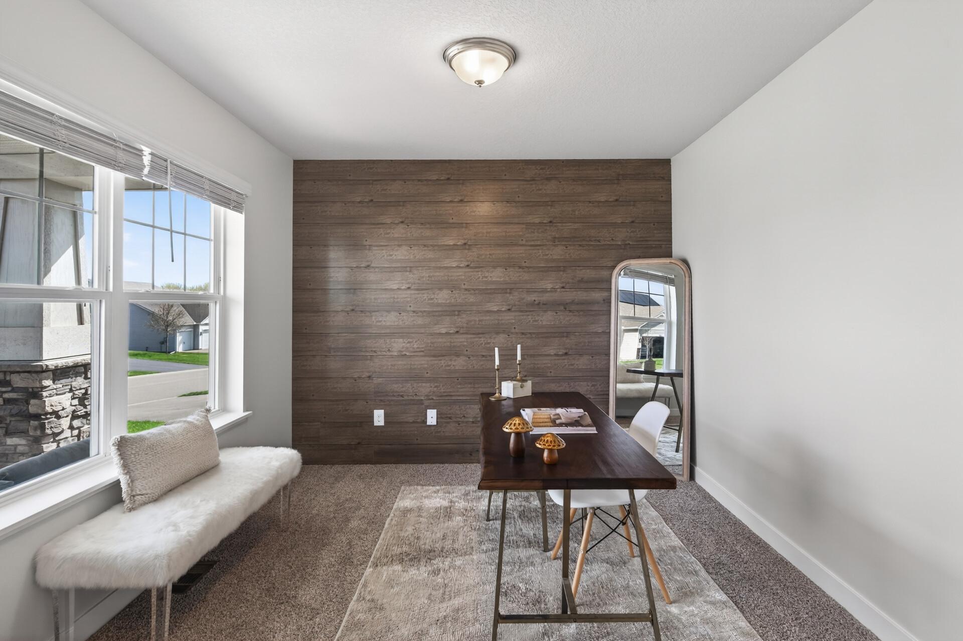 Versatile flex room perfect for a home office, reading nook, or playroom.