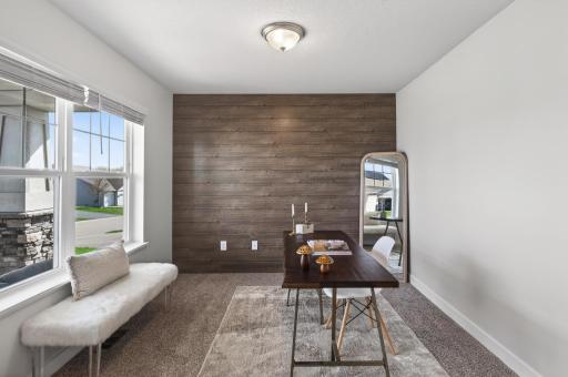 Versatile flex room perfect for a home office, reading nook, or playroom.