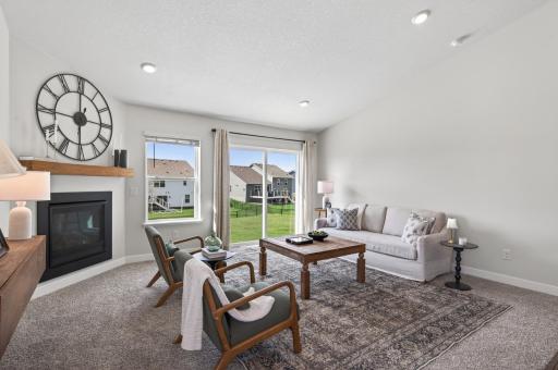 Cozy sitting area filled with natural light and future potential seamless access to the backyard.