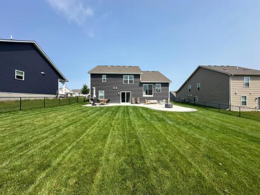 Expansive backyard offering endless possibilities for entertaining, play, or relaxation.