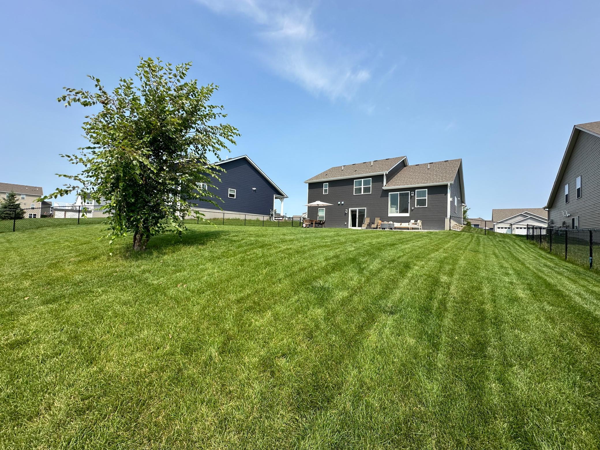 Oversized backyard with scenic views and plenty of room for outdoor activities.