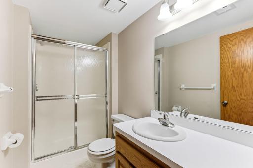 Comfortable lower-level 3/4 bath with a bright, clean design and a spacious showerâperfect for guests or everyday use.