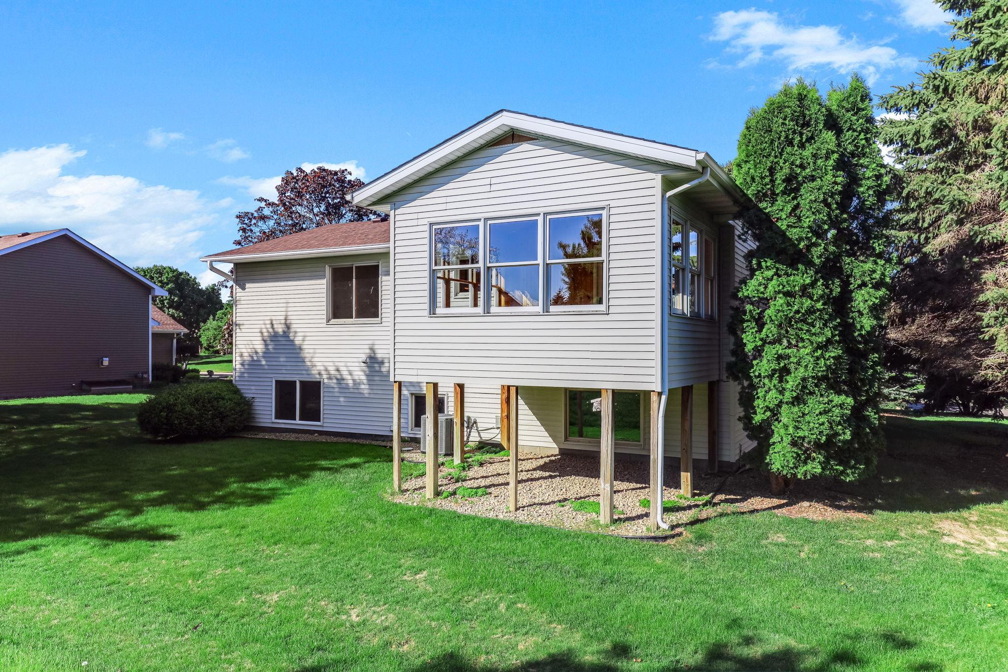 A bright, open yard with vibrant greenery and a clean, inviting outdoor atmosphere.