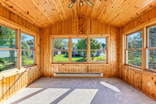 Charming sunroom with expansive windows that showcase outdoor views and make the space perfect for morning coffee or quiet afternoons.