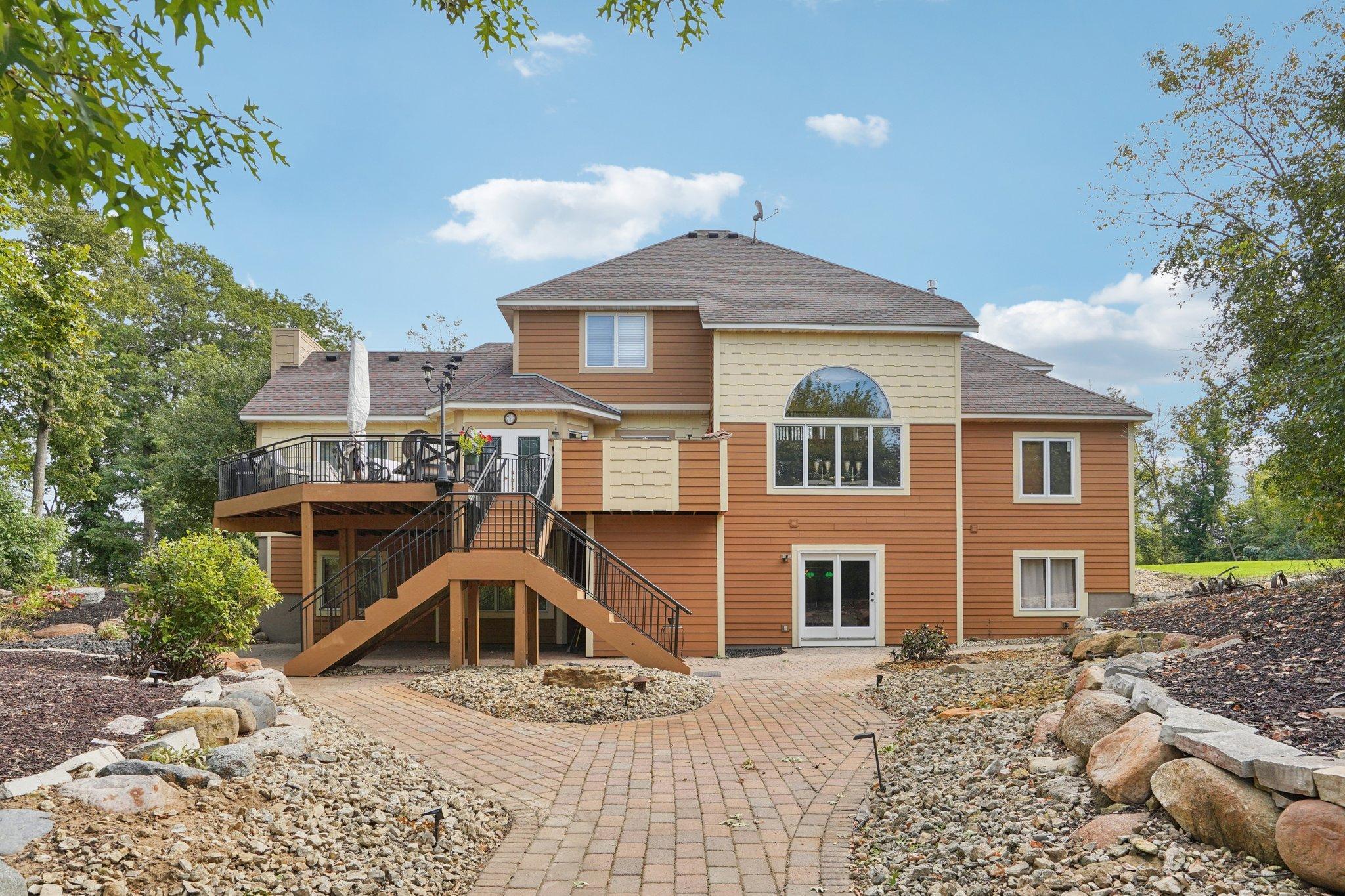 Deck and paver patio extend your entertaining needs outdoors.