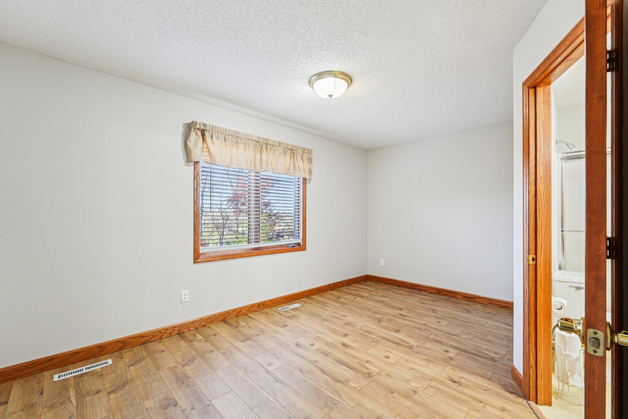 Second 2nd level bedroom with it's own private full bathroom.