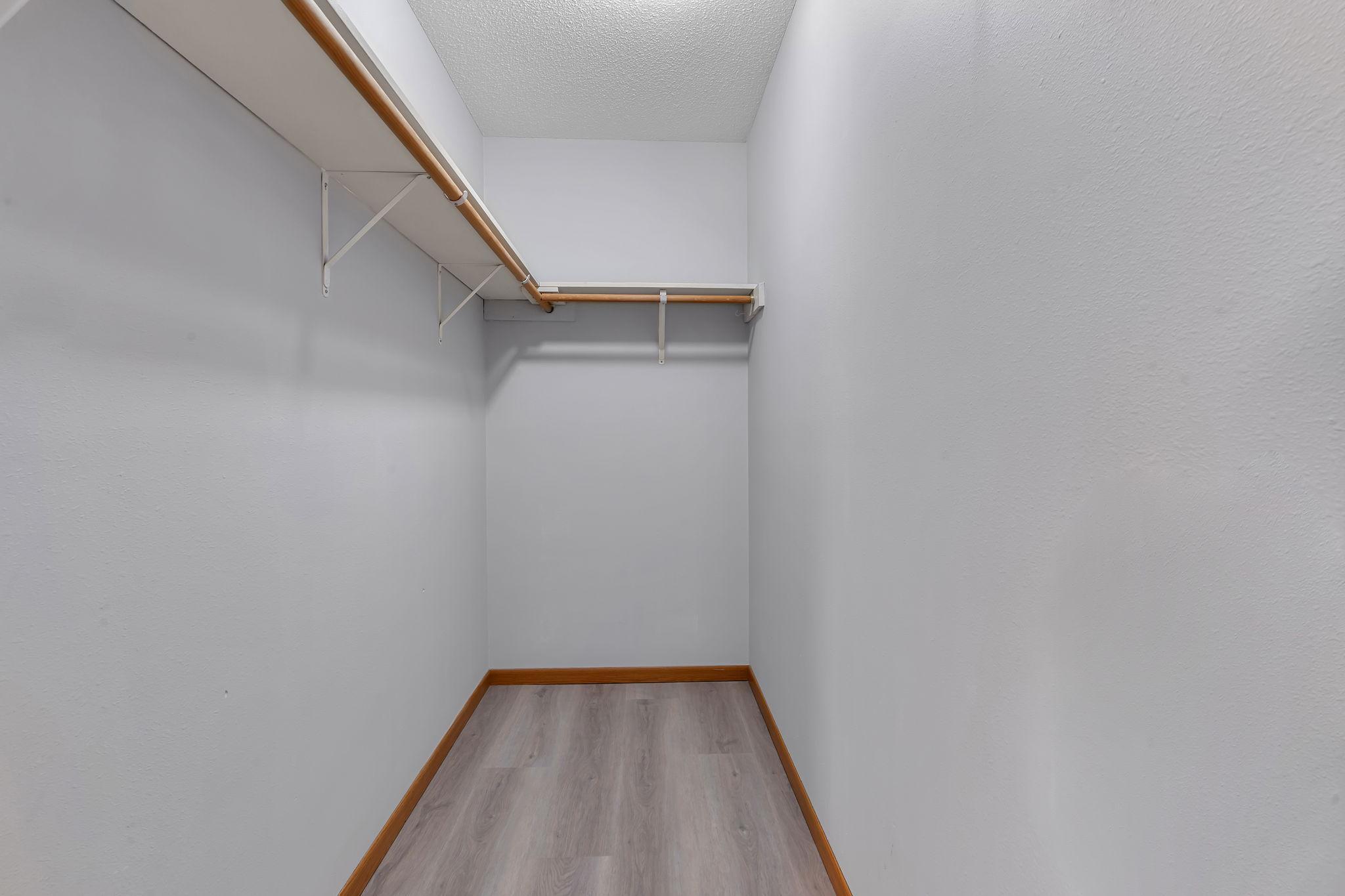 Primary bedroom walk-in closet!