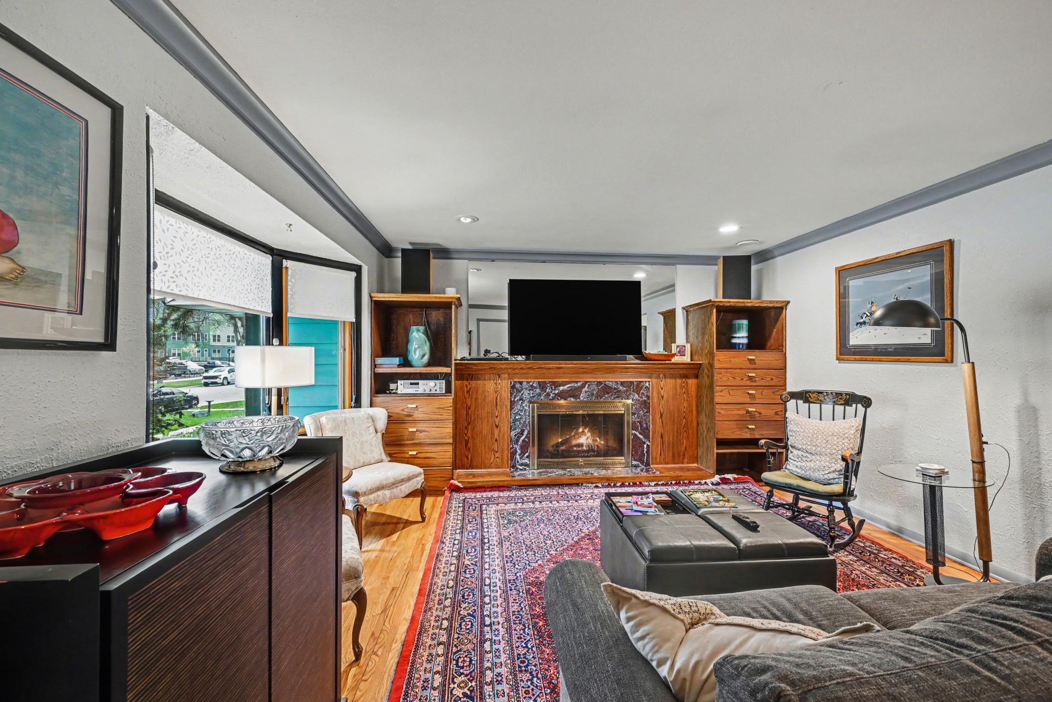 Living room w/ built in cabinets.