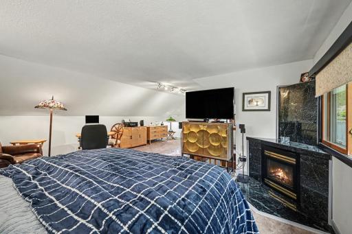 Primary Suite w/gas fireplace - upper level.