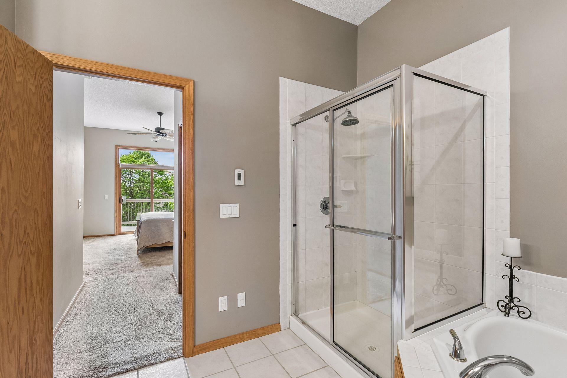 Primary bedroom with private bath and walk in shower