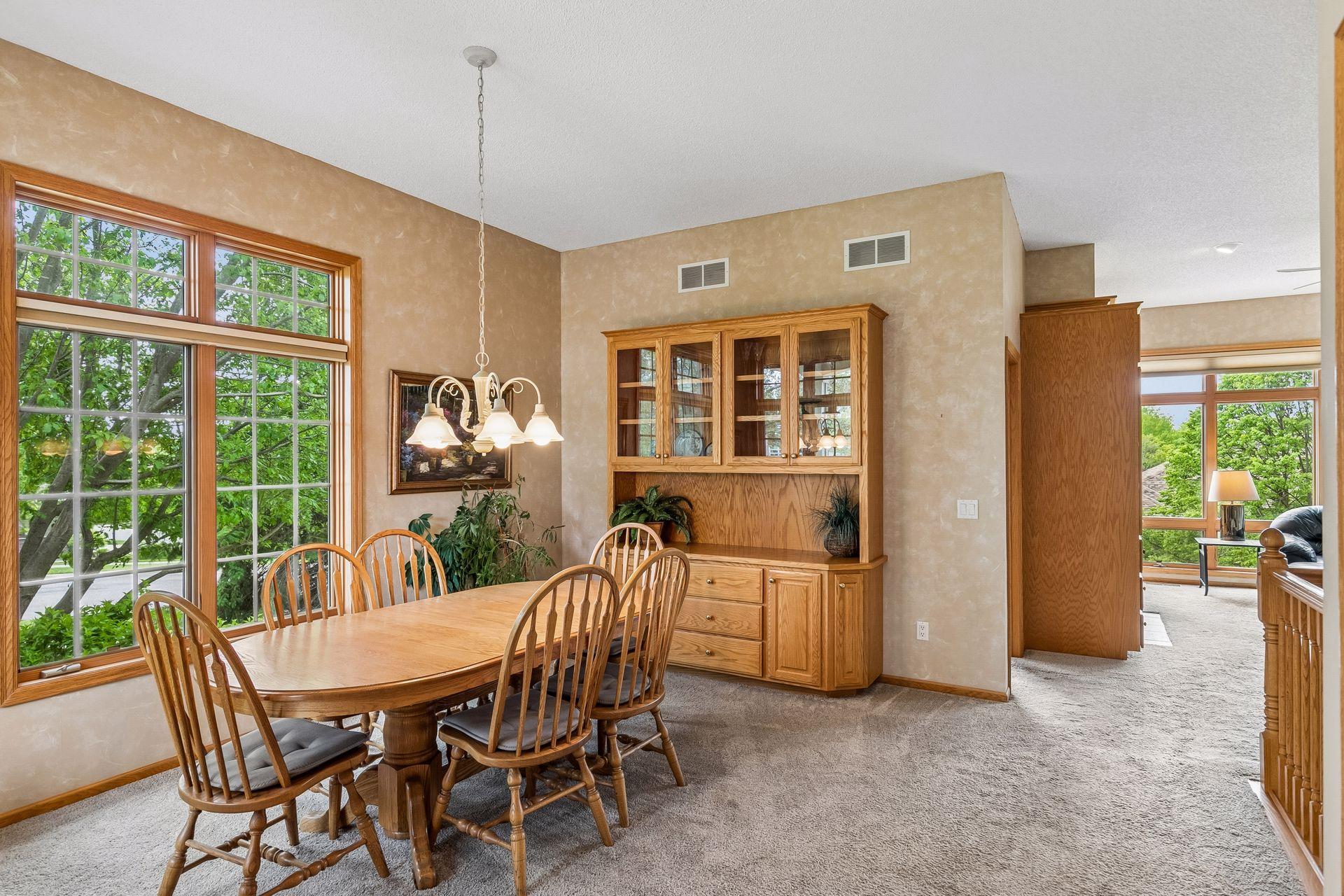 Beautiful dining area with built in cabinets