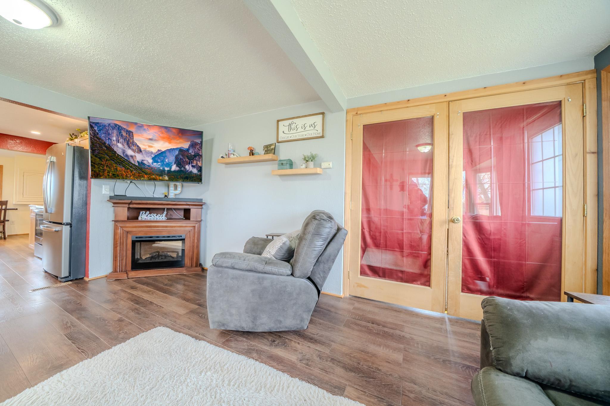 Living room with French doors into bedroom