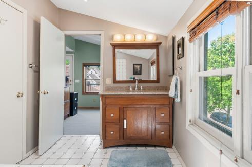 Door off Primary Full Bath to Office / 5th Bedroom Nursery