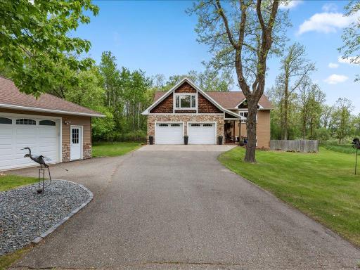 Two car attached garage and 4 car detached garage