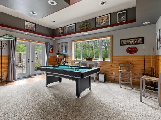 Opens out to the lower level deck with hottub