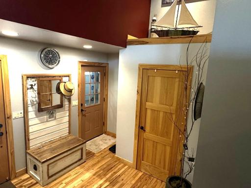 Attached garage access door and closet