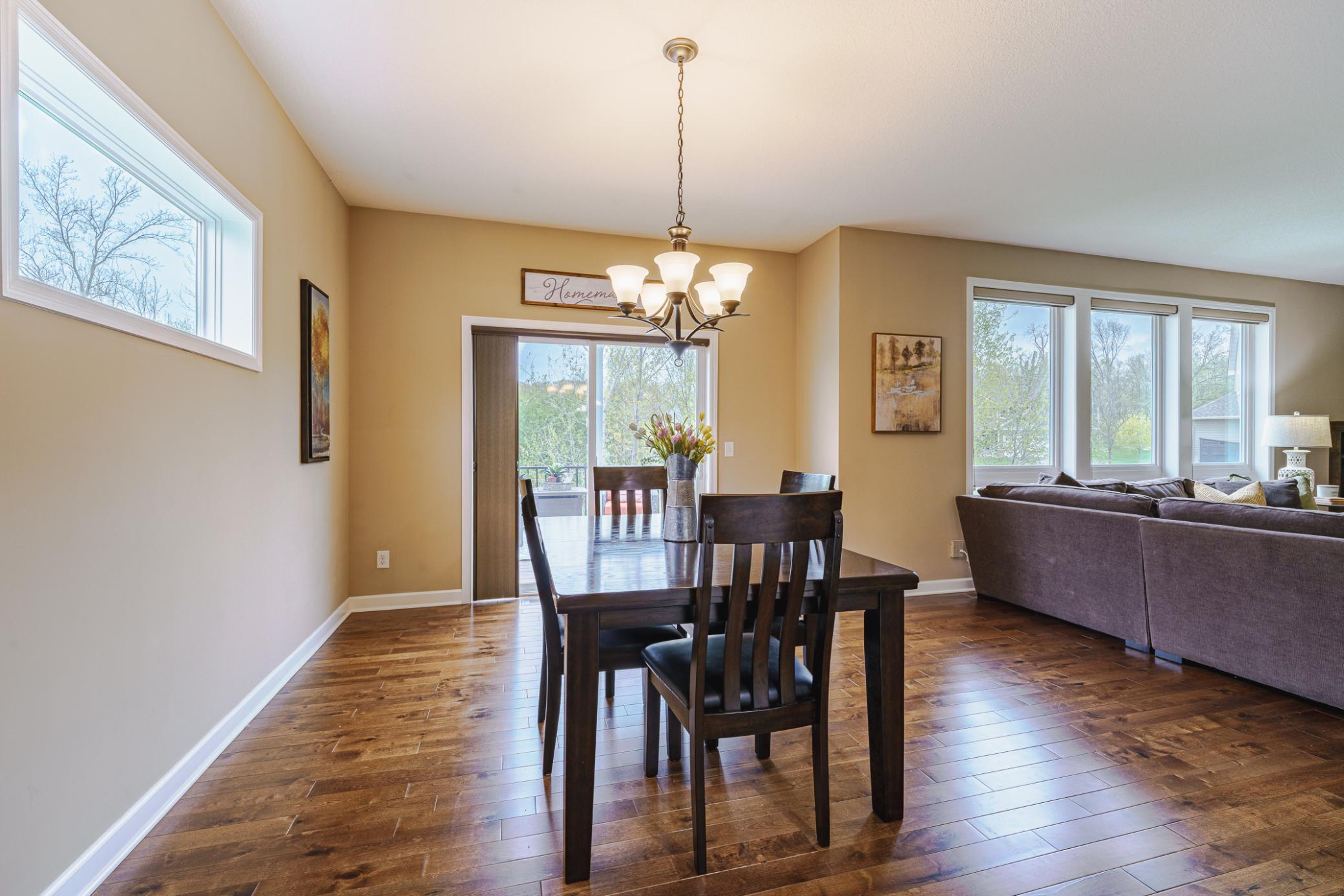 The kitchen leads to a composite deck off the back of the home.