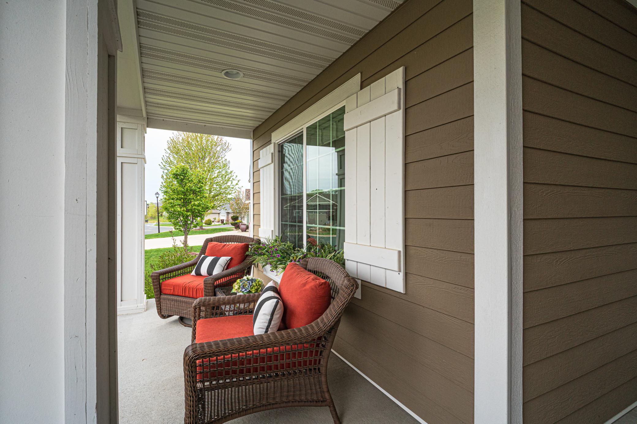 The covered front porch is a comfortable place to enjoy a shady afternoon beverage.