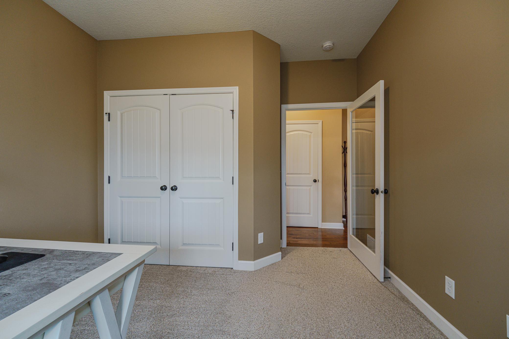 This room has a single glass entry door.