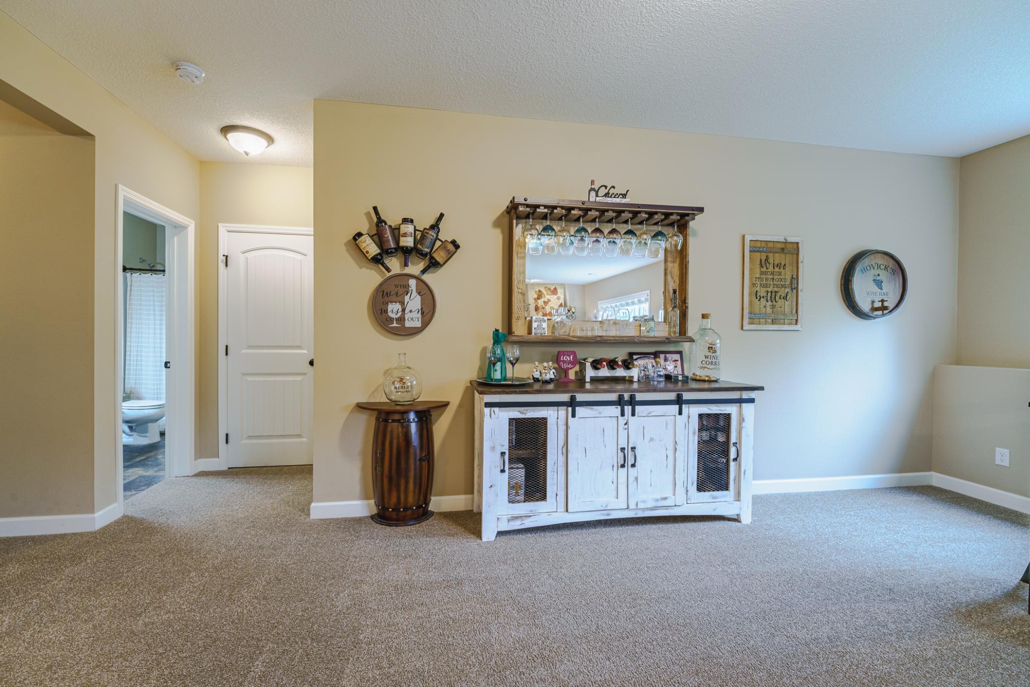 Two bedrooms and a bathroom are also on this level.
