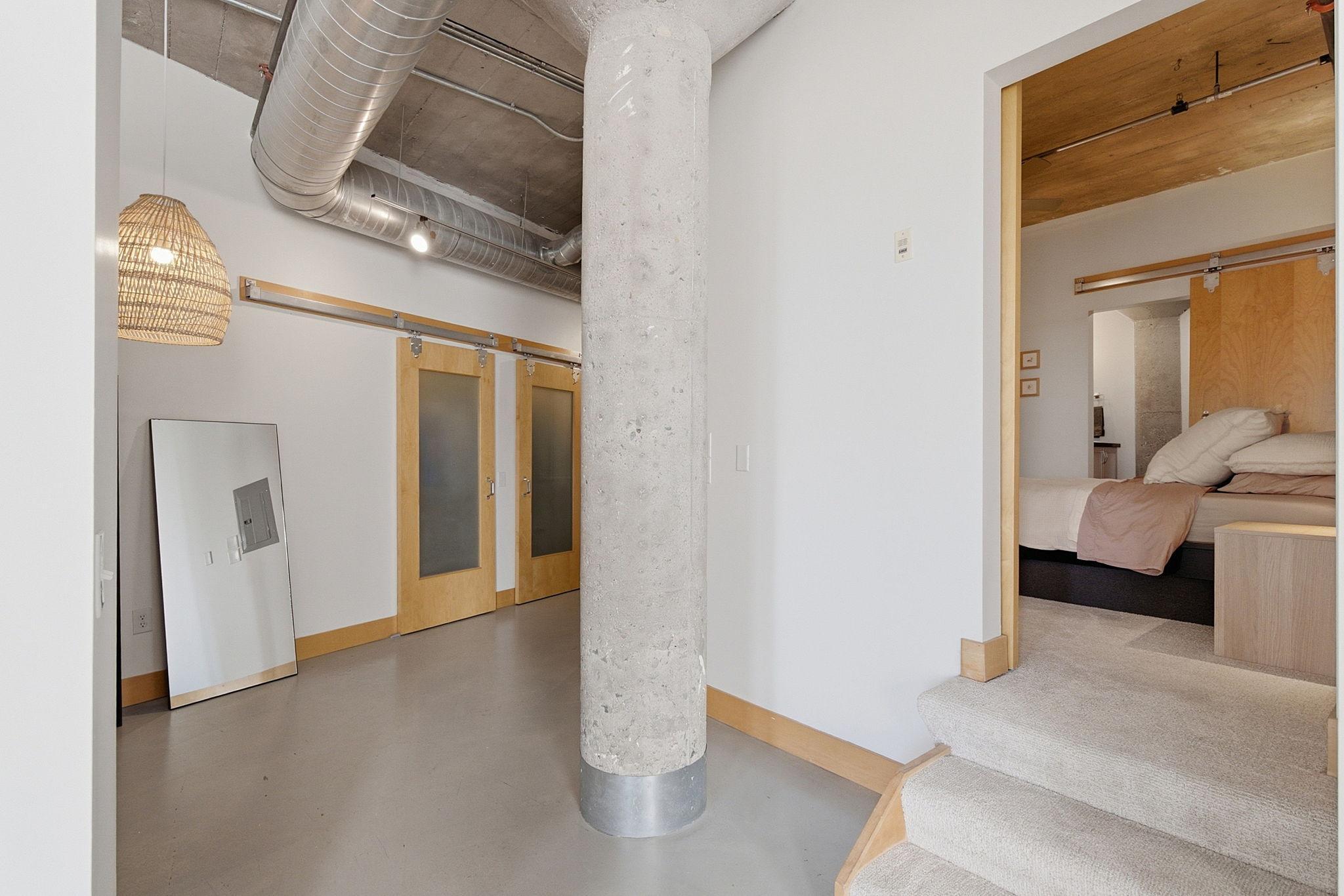 Steps leading to the primary bedroom.