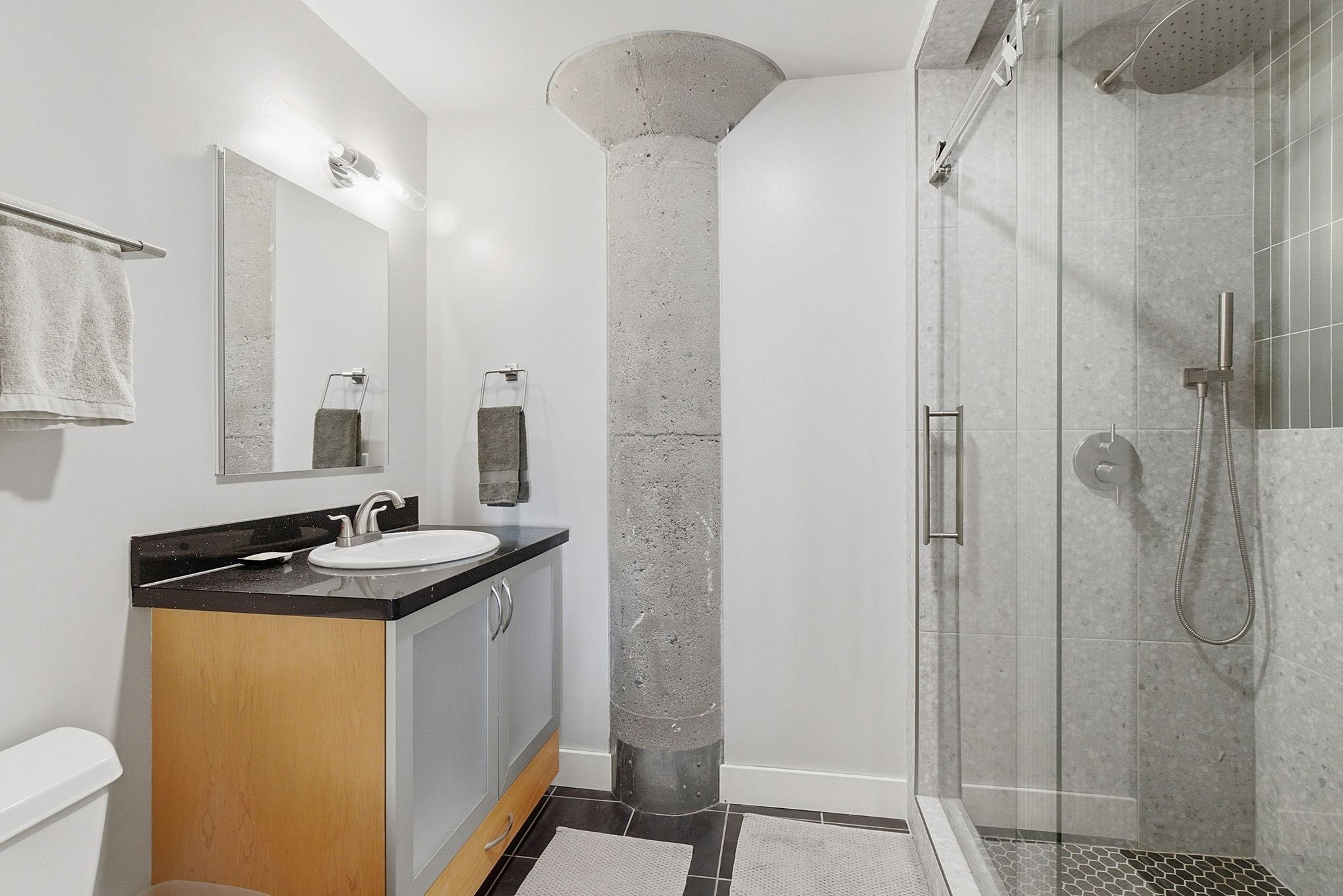 Newly remodeled primary 3/4 bath with gorgeous shower.