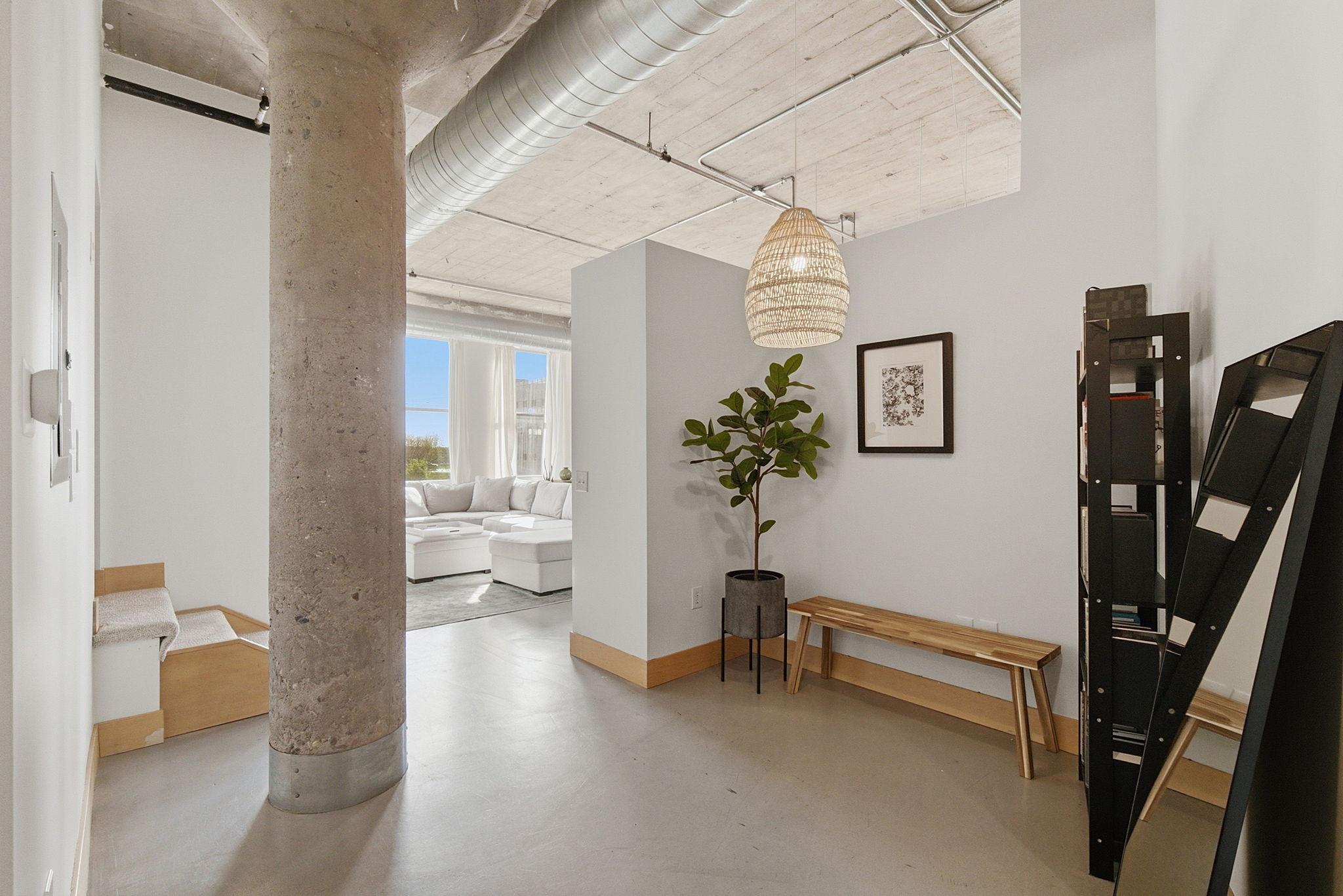 Foyer with space for storage or small sitting area.