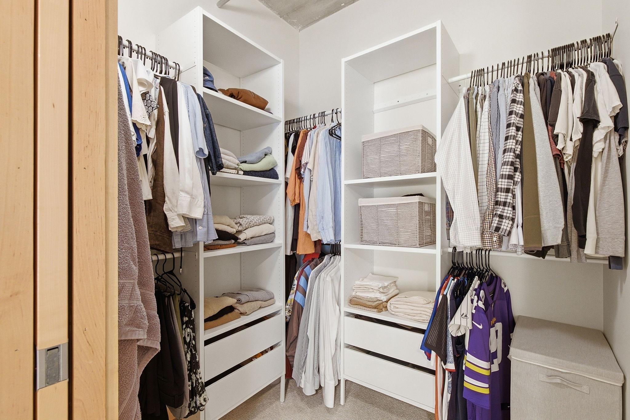 Large primary closet with built-ins.