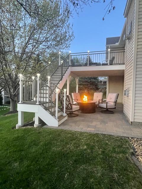 Generous sized paver patio makes having an evening fire warm and relaxing