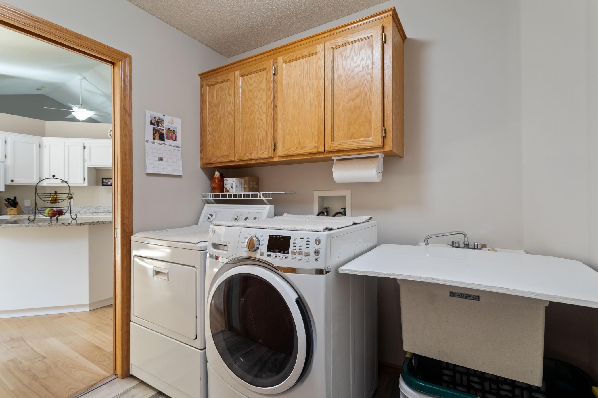Main level laundry has utility sink, Cabinet storage, Plus a generous closet.