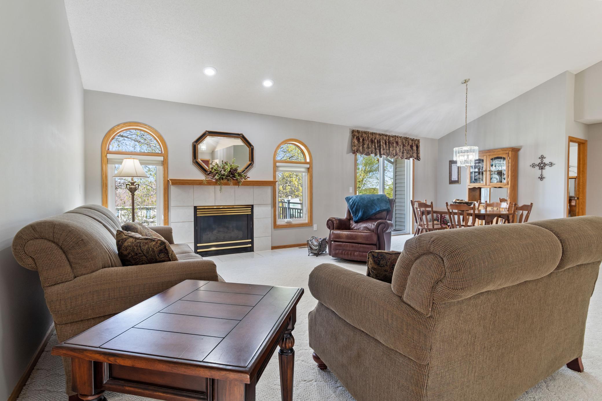 Living/ Dining room combo offers a spacious feeling from the vaulted ceilings.
