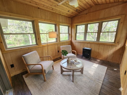 Upper level: 3 season sitting room (virtually staged)