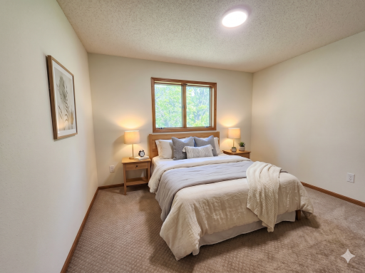 Upper level: primary bedroom with bathroom
