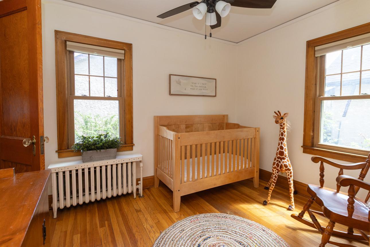 Hardwood floors continue through this room and great natural light flows in