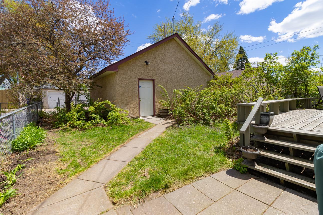 Sidewalk leads to the detached garage