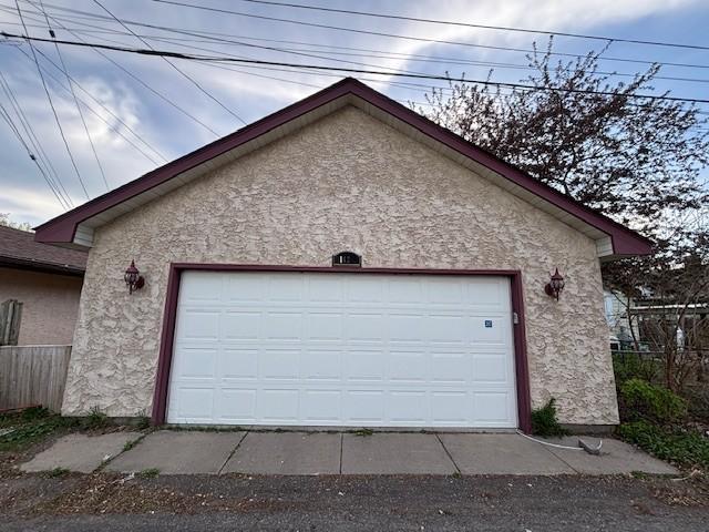 2.5-car detached garage with attic for storage (can fit 3 regular size cars inside)