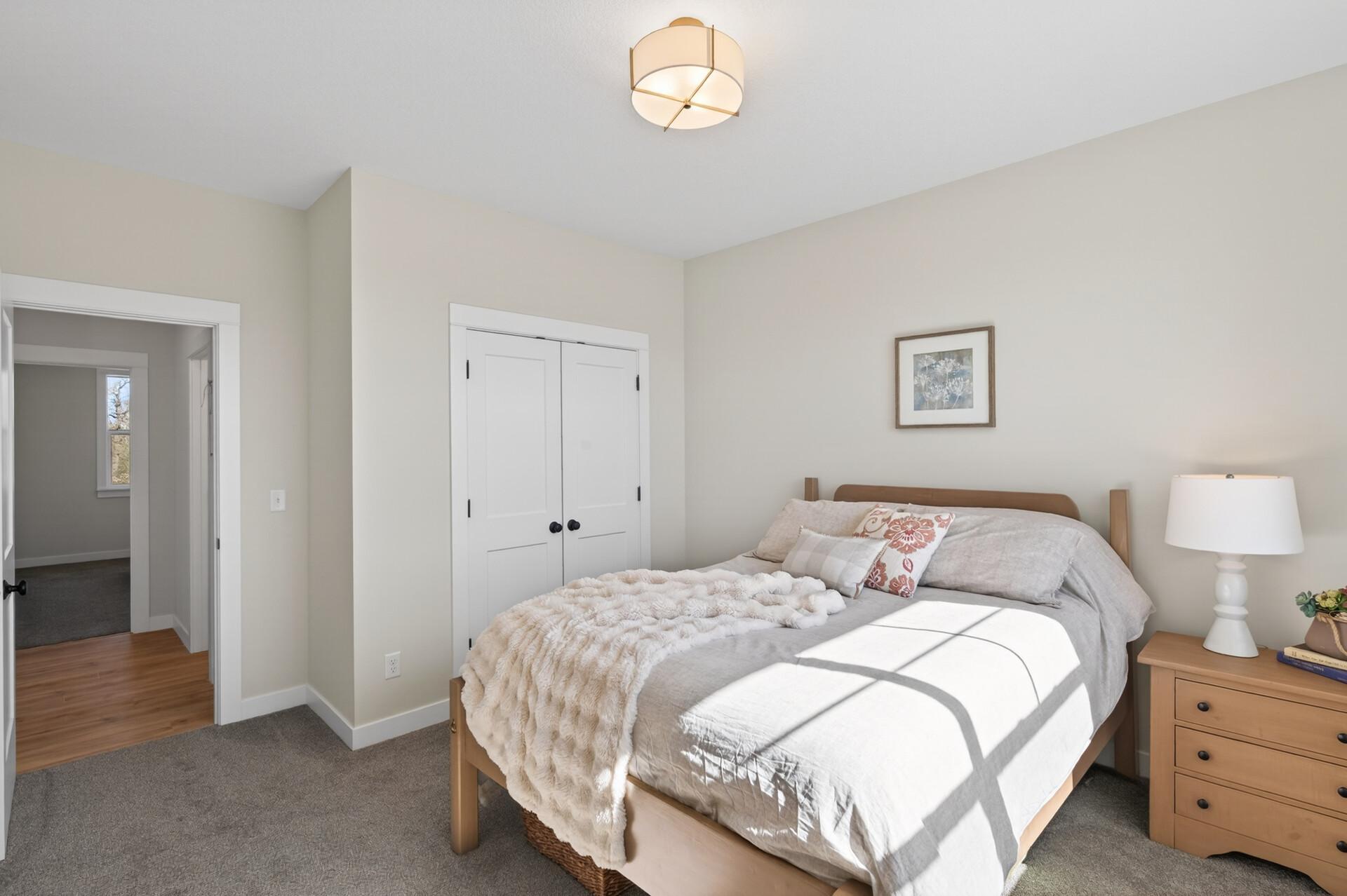 Double door closets in guest bedrooms