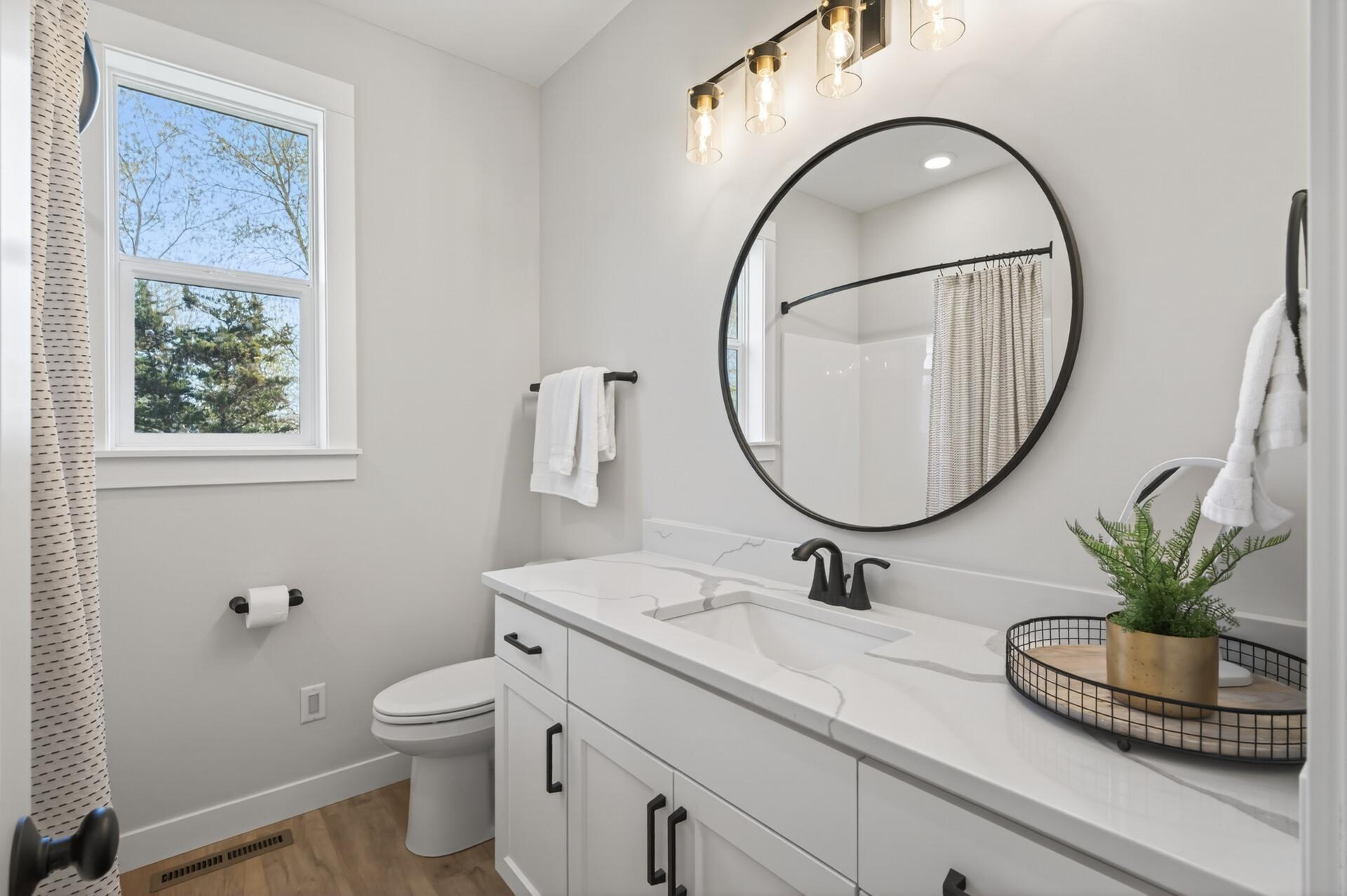 Upper level full bath with quartz counters