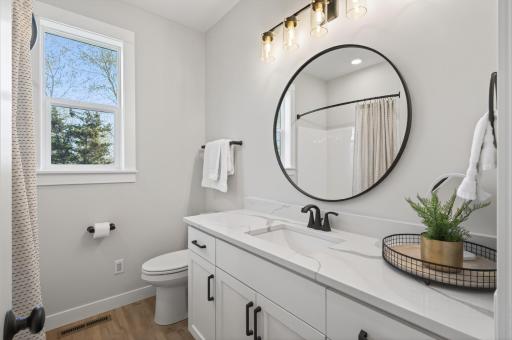 Upper level full bath with quartz counters