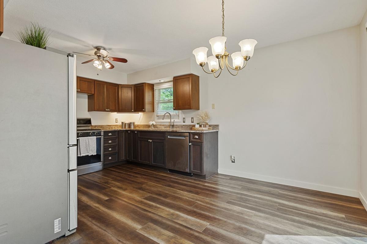 The south facing patio door makes the kitchen and dining areas light & bright!