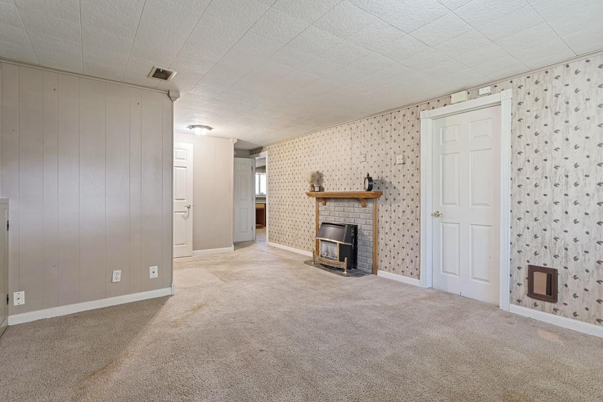 The large utility room is located off the family room and has a built-in pet door.