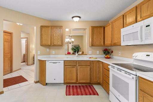 Convenient kitchen has lots of storage space